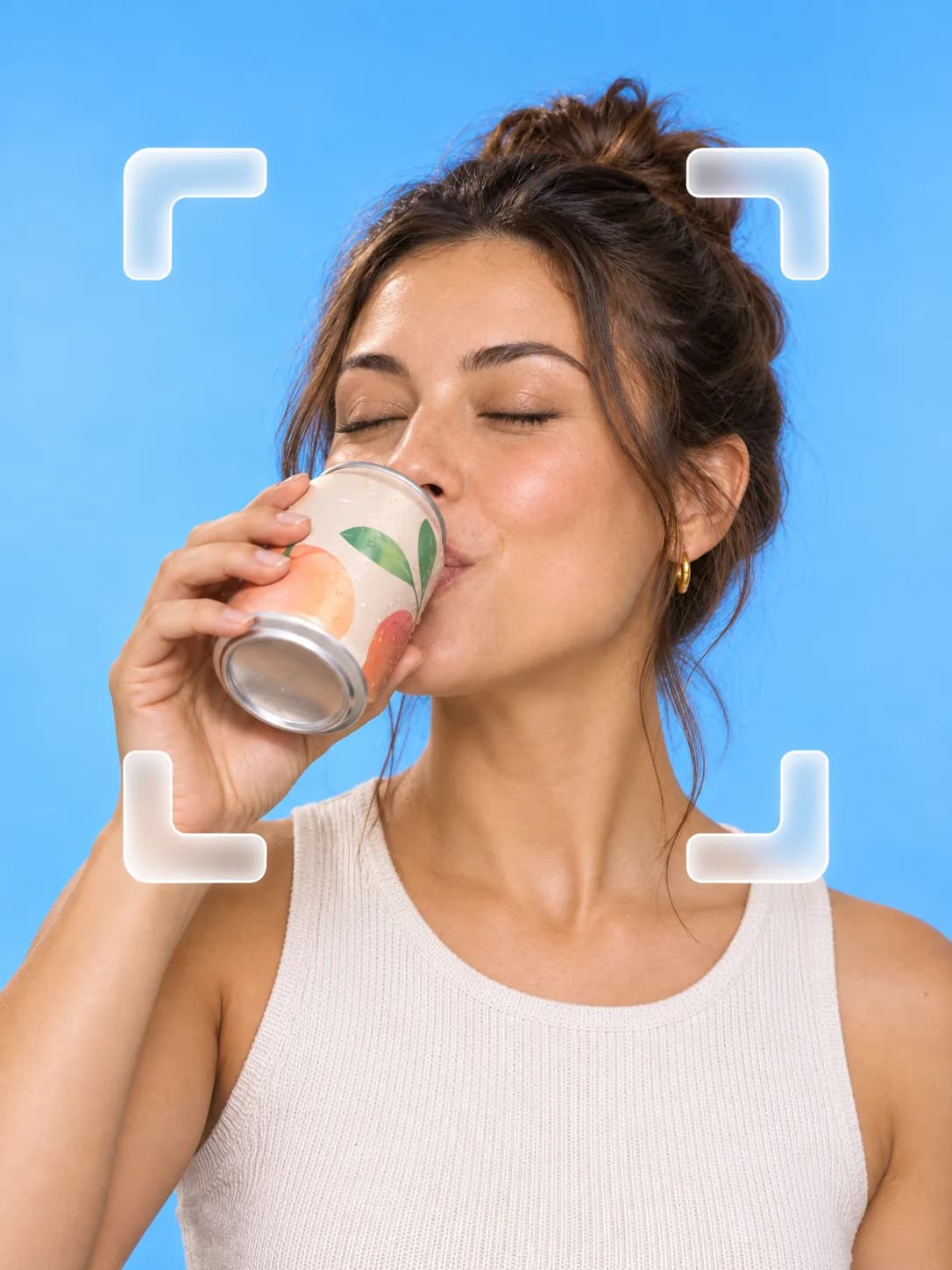 Creator drinking a canned soda in a bright blue studio
